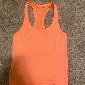 Orange lululemon swiftly tech tank